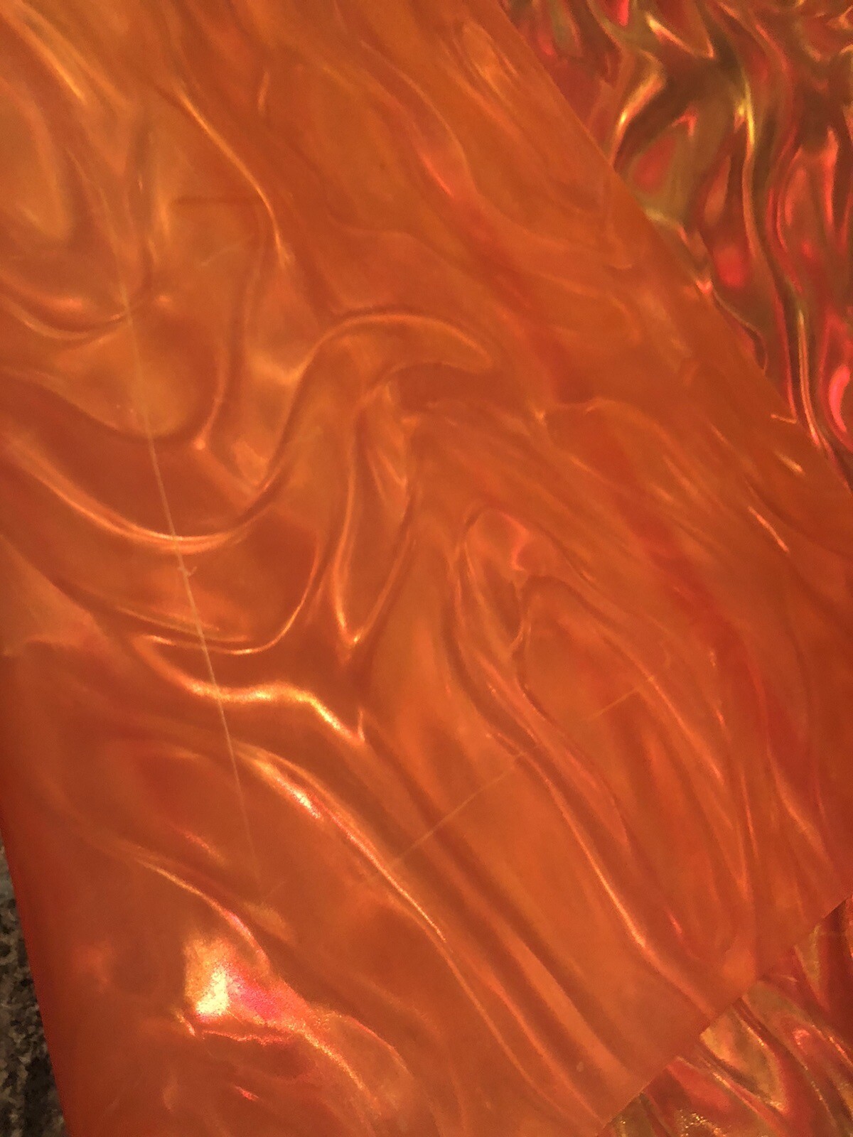 Orange Backdrop screen 25” x 88”, ribbon prismatic, metal/plastic hanging frame