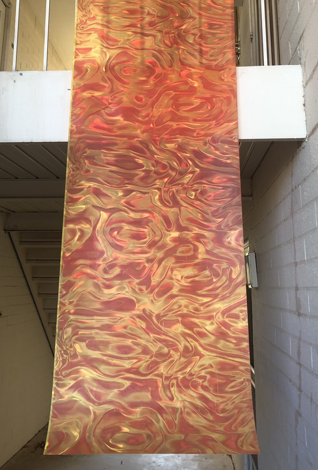 Orange Backdrop screen 25” x 88”, ribbon prismatic, metal/plastic hanging frame