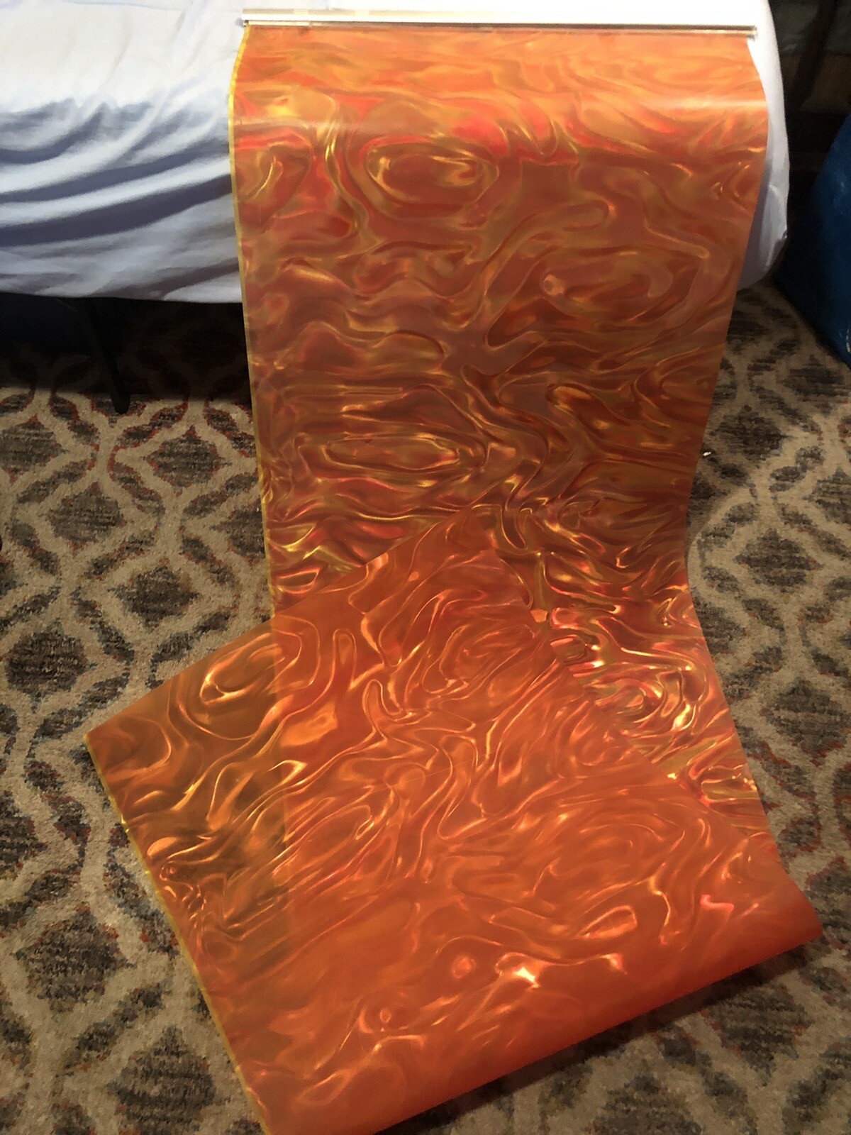 Orange Backdrop screen 25” x 88”, ribbon prismatic, metal/plastic hanging frame
