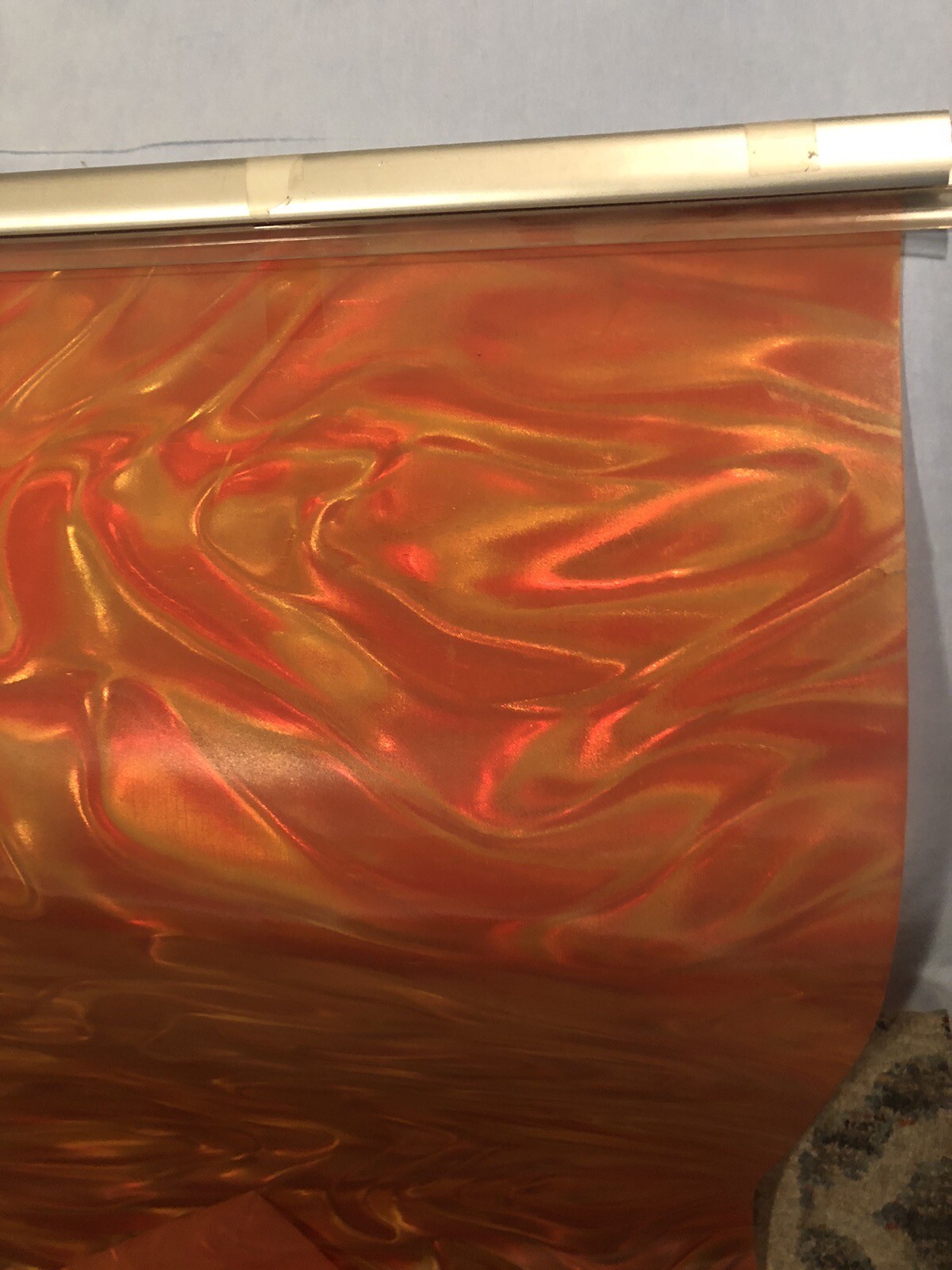 Orange Backdrop screen 25” x 88”, ribbon prismatic, metal/plastic hanging frame